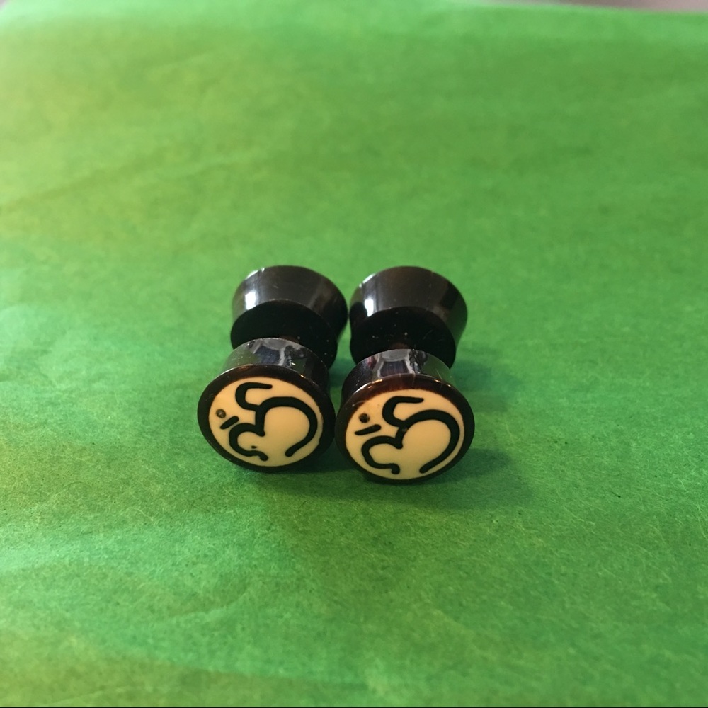 Ohm fake plug style earrings